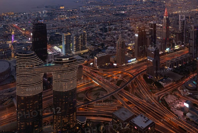A picture of the Address Sky View Hotel and the busy Al Safa Street and Sheikh Zayed road intersection at night