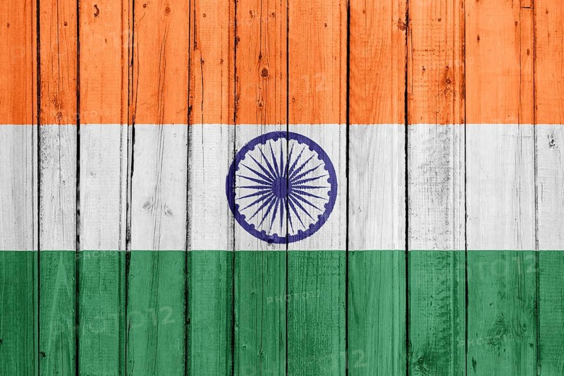 The Indian flag painted on a wooden fence
