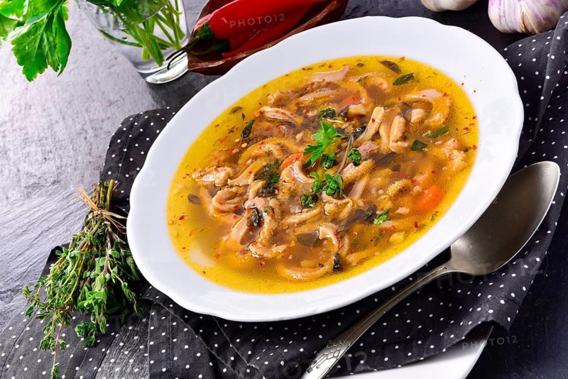Traditional Politur-style tripe soup with beef and vegetables