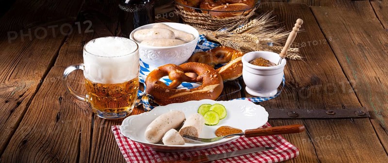 Delicious bavarian oktoberfest white sausage with sweet mustard