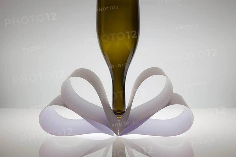 Symmetry abstract - Paper Background with wine glass on a glass table
