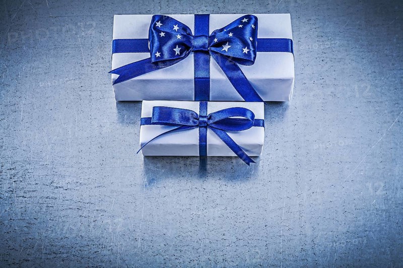 Set of present boxes on metallic background celebrations concept