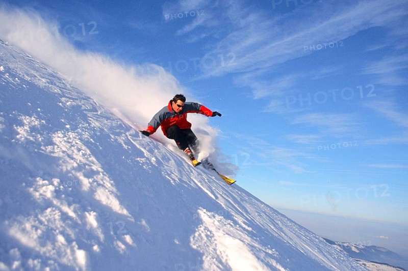 Skiers in action, Alps, Austria, Europe