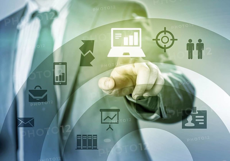 Close up of businessman touching icon of media screen