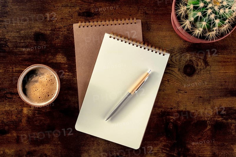 Notebook with a pen, coffee, and plant, overhead flat lay shot on a rustic wooden desk, a mockup, Food photography, Food photography