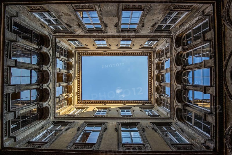 Old building in a historic city centre in Eastern Europe. Courtyards or backyards in typical architectural style. Urban life in Budapest, Hungary, Europe