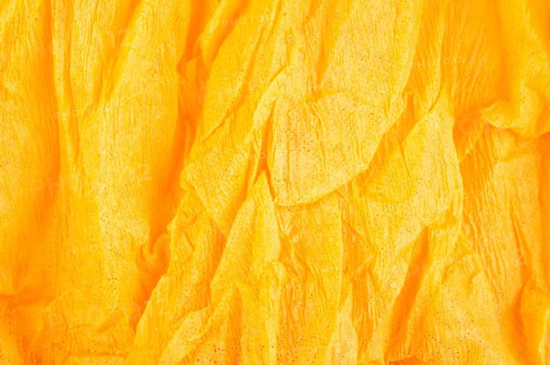 Background of orange old crumpled paper