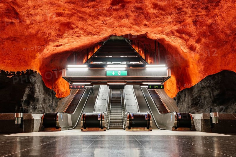 Stockholm, Sweden, August 9, 2019: Escalator of T-Centralen Stockholm underground metro station. Almost every Stockholm station has its own art decoration, Europe