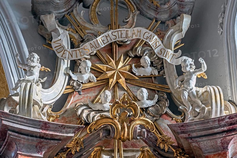 Putti and the Latin saying, When they saw the star, they were delighted, St George and Florian is a listed Catholic parish church in Reicholzried, Allgäu, Bavaria, Germany, Europe