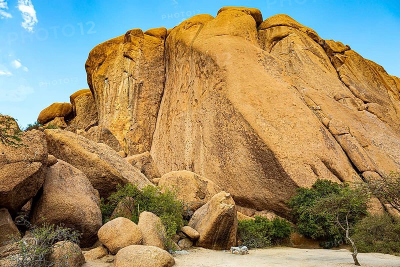 Spitzkoppe is a small picturesque rock massif in Namibia. Africa. Namibia. Huge rounded boulders in the middle of the vast Namibian desert