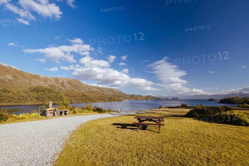 The picturesque landscape from Lake Pedder Wilderness Lodge over Lake Pedder on a hot summer's afternoon in Southwest National Park, Tasmania, Australia, Oceania