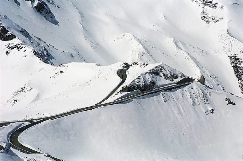 The famous Grossglockner mountain road leads throug snow-covered mountains. Hohe Tauern National Park. Great spring trip to Austria. Snow in May