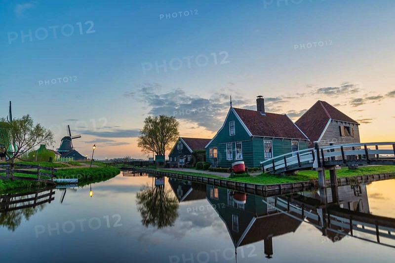Amsterdam Netherlands, Sunrise landscape of Dutch Windmill and traditional house at Zaanse Schans Village
