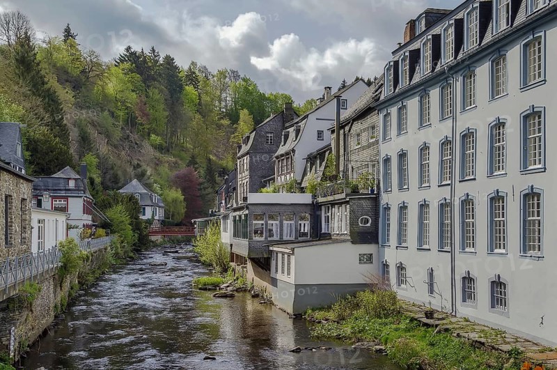 Picturesque houses along the Rur River in the historic center of Monschau, Germany, Europe