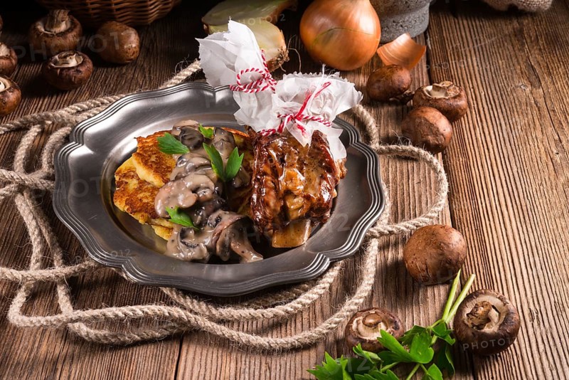 Grilled ribs with potato pancakes
