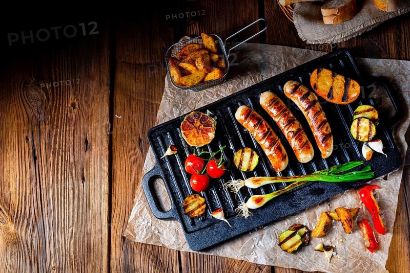 Delicious grilled sausage with various grilled vegetables