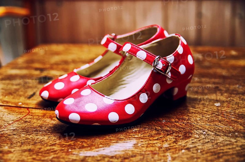 Red dance shoes with white dots