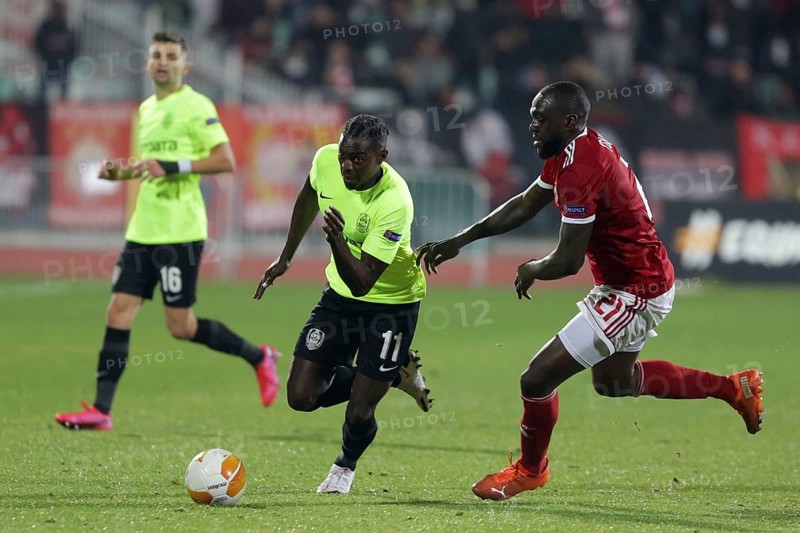 Sofia, Bulgaria - 22 October, 2020: Amos Youga (R) of PFC CSKA-Sofia in action against Michael Pereira (C) of CFR 1907 Cluj during the UEFA Europa League group A football match between CSKA Sofia and CFR Cluj, Sofia, Bulgaria, Europe