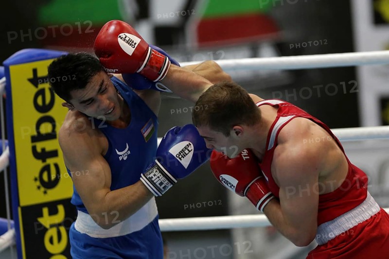 Sofia, Bulgaria. 27th February, 2021. Ruslan Kolesnikov (red) of Russia and Dilshodbek Ruzmetov of Uzbekistan fight in their final round of Light Heavy (81kg) category of the 72-nd International Boxing Tournament Strandja 2021, Sofia, Bulgaria, Europe