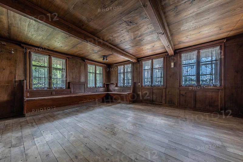 The living room with wooden corner bench in a house built around 1750 that has since been demolished. Menznau, Lucerne, Switzerland, Europe