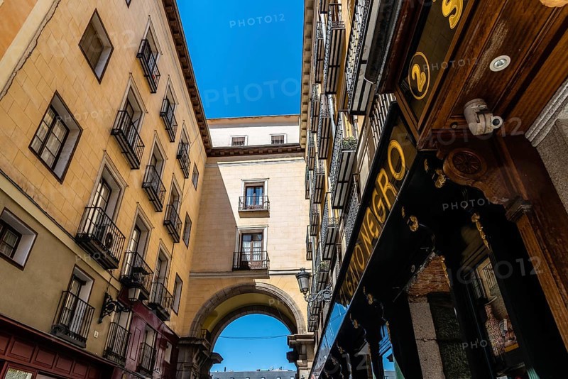 Madrid, Spain, June 1, 2019: Toledo Street near Plaza Mayor. Low angle view of old buildings, Europe