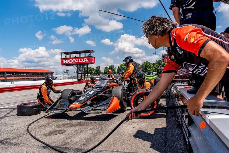 SANTINO FERRUCCI (14) of Woodbury, Connecticut comes down pit road for service during the Honda Indy 200 at Mid-Ohio Sports Car Course in Lexington, OH