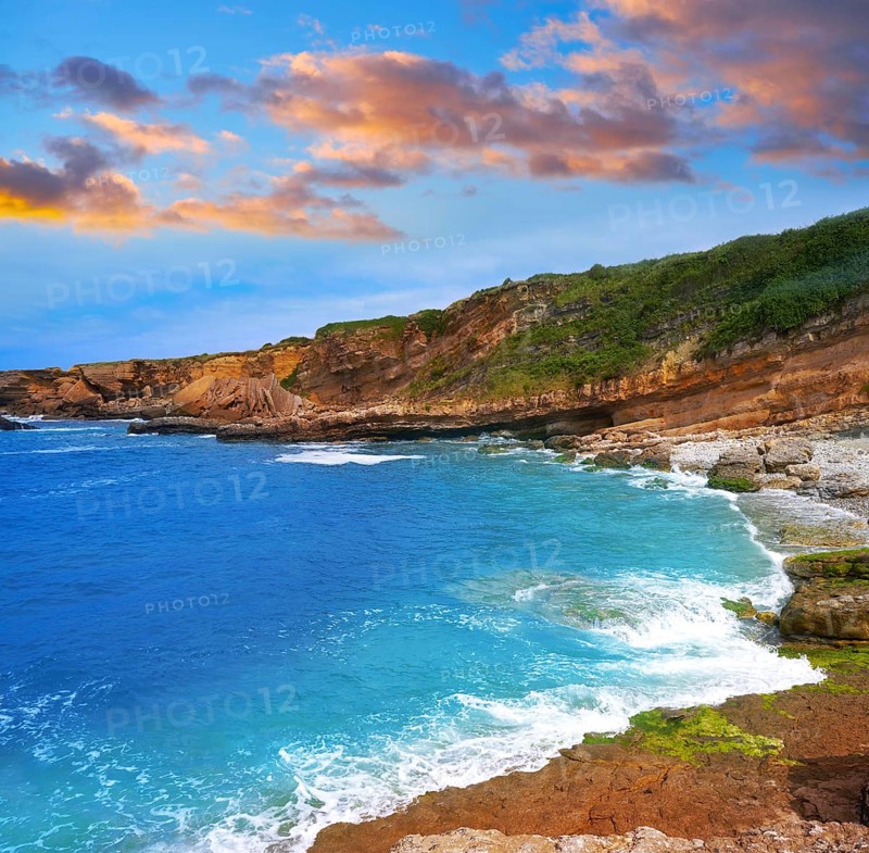 Antromero beach of Cristales with glass stones in Asturias of Spain