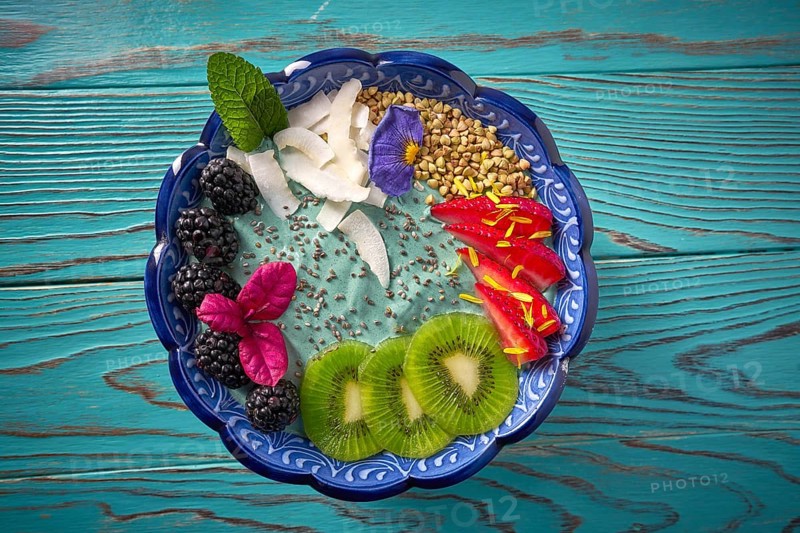 Acai bowl smoothie with kiwi blackberry strawberry and chia seeds