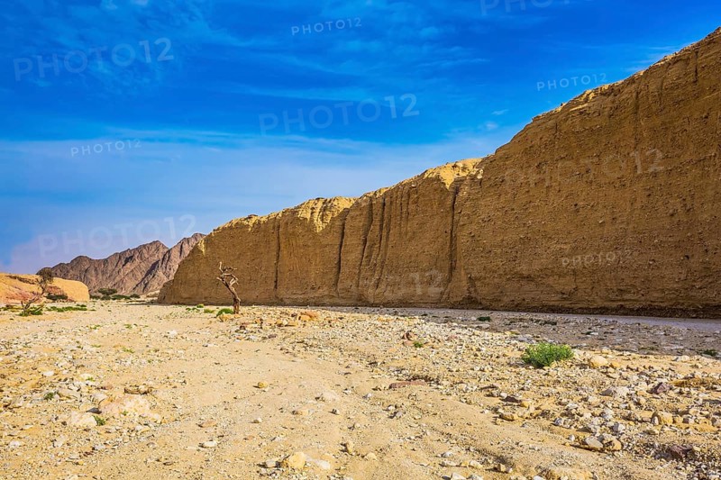 The majestic beginning of Black Canyon. The stone desert in mountains of Eilat, Israel, Asia