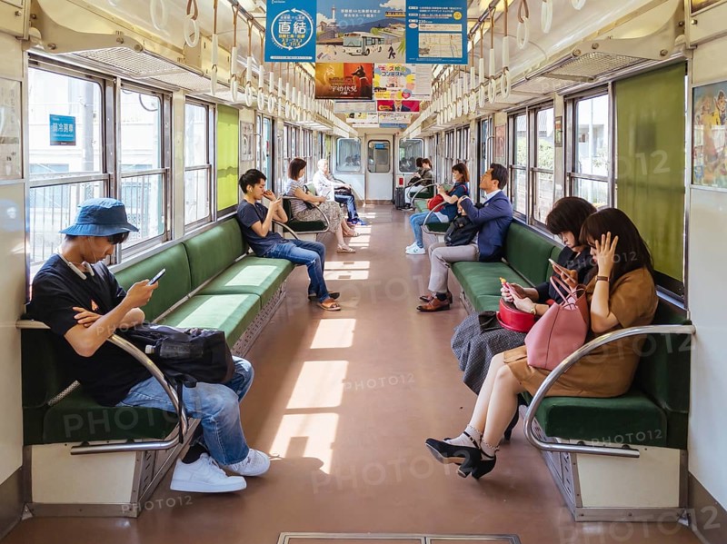 Kyoto, Japan - May 13 2019: People on a train near Sanjo Train Station in Kyoto, Japan, Asia