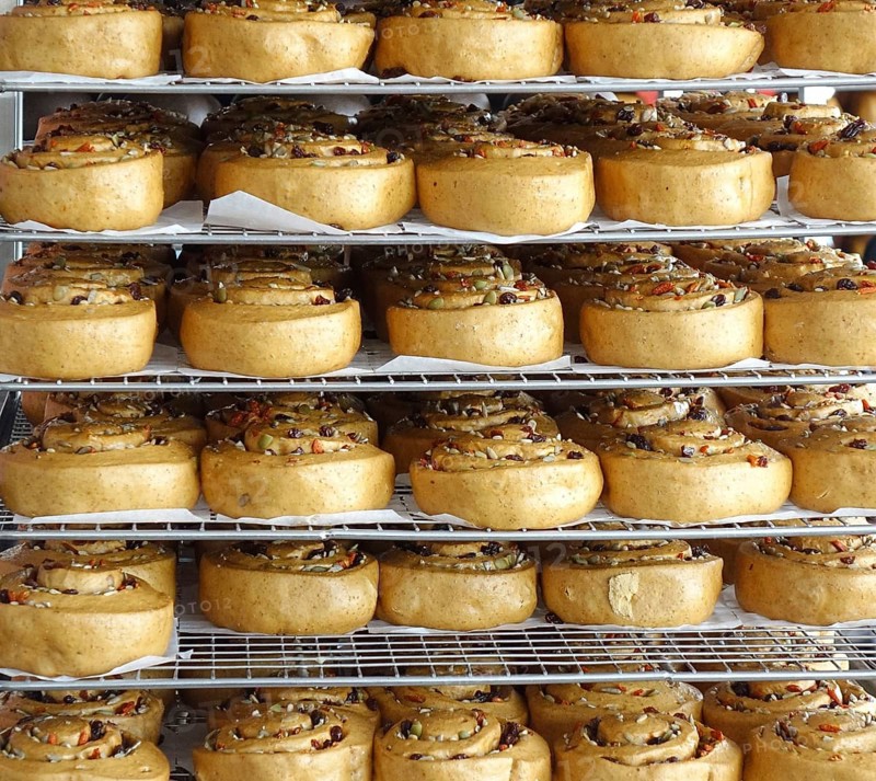 Chinese steamed buns with dried fruits and nuts on cooling racks