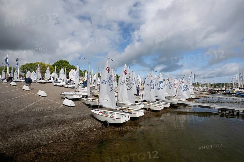 Andreas Dick, Olympic Centre - Schilksee, Kiel, Schleswig Holstein, Before the regatta, all participants and their boats, racing equipment in the harbour in front of jumping into the water, Golden Opti 2025 on 24.05.2025 at the Olympic Centre, Schilksee in Kiel Germany