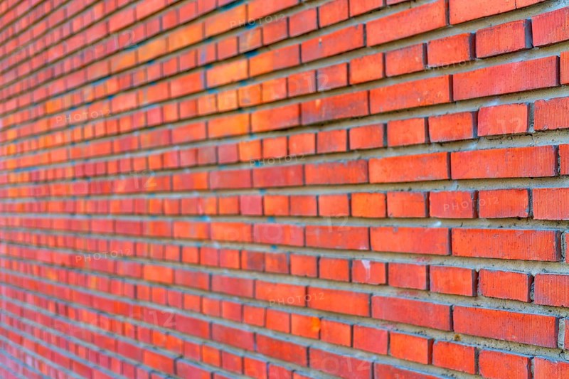 The background of the old red brick wall for design interior and various scenes or as a background for video interviews