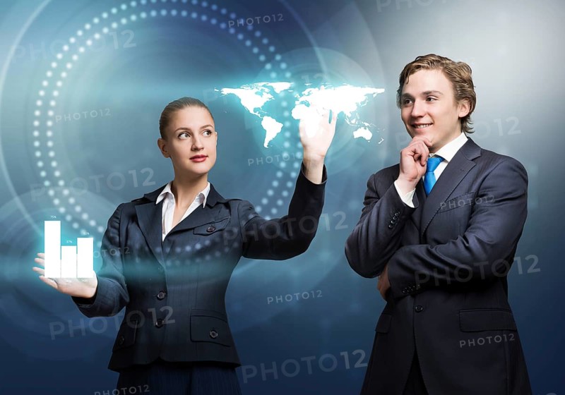 Young businessman and businesswoman working in cooperation with virtual panel