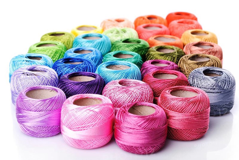 Color thread heap isolated on white