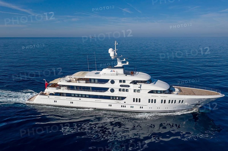 Aerial view 74 metre motor yacht AURORA, delivered in 2017 by the German shipyard Lürssen Yachts, Design Winch Design, sailing past Roquebrune Cap Martin in the morning to the Principality of Monaco, Cote d'Azur, Mediterranean Sea