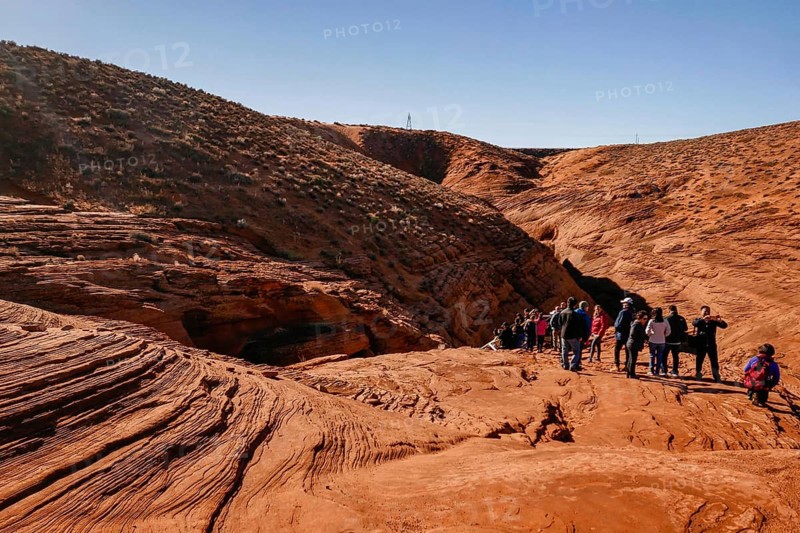 Antelope Canyon is a slot canyon in the American Southwest, on Navajo land east of Page, Arizona. the erosion of Navajo Sandstone 2 due to flash flooding and other sub-aerial processes