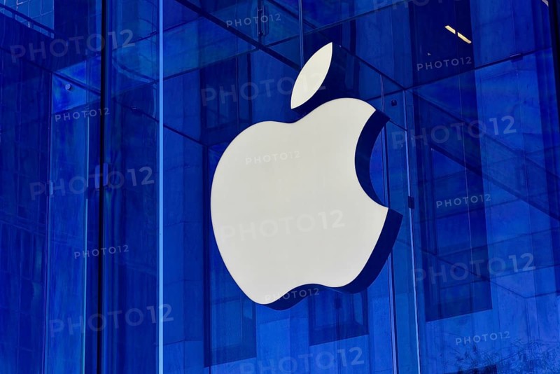 Manhattan, New York City, New York, USA, North America, Large Apple logo on a modern glass building with blue tint, United States of America, North America