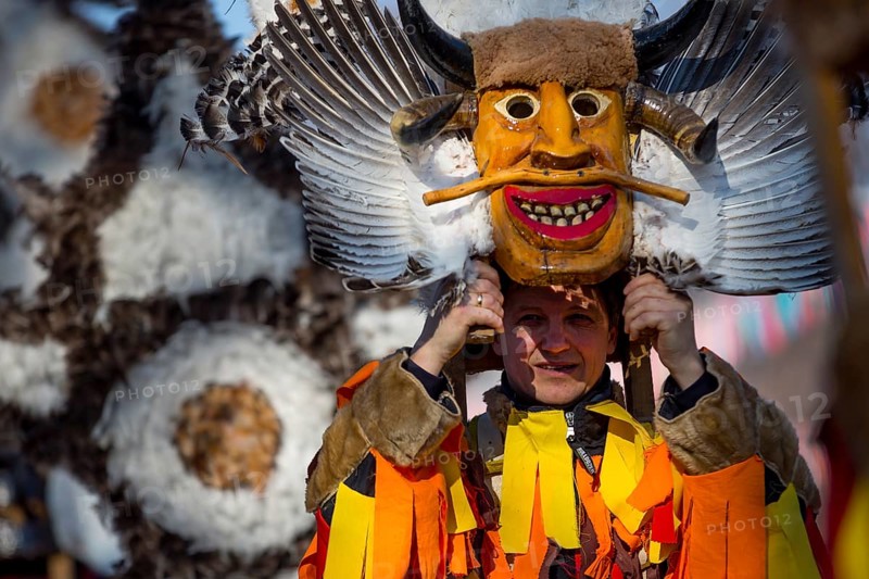 Pernik, Bulgaria - 28 January 2018: Participants take part in the International Festival of Masquerade Games Surva. The festival promotes variations of ancient Bulgarian and foreign customs and masks
