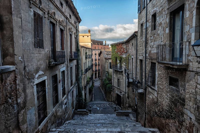 Old Town (Barri Vell) historic architecture in city of Girona in Catalonia, Spain, buildings along Sant Domenec stairs, Europe