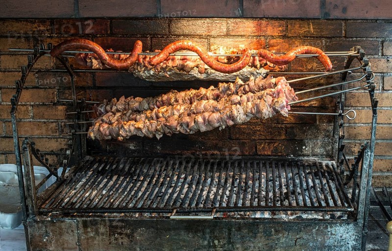 Grilled meal on a skewer in restaurant