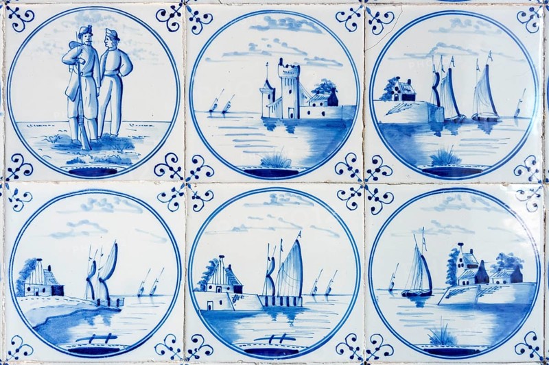 An image of six typical blue delft tiles