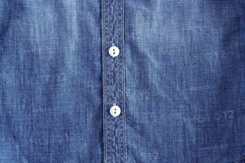 Denim blue jeans shirt with buttons detail texture