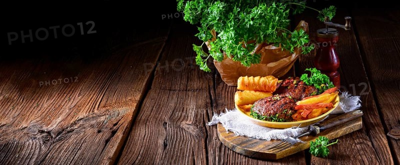 Grilled bullets with croquettes and vegetables