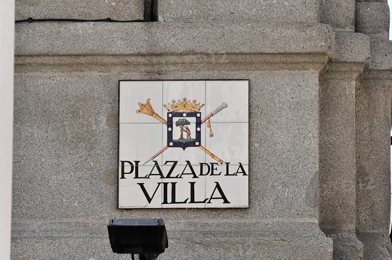 Coat of arms sign on a stone wall with the inscription 'Plaza de la Villa', Madrid, Spain, Europe