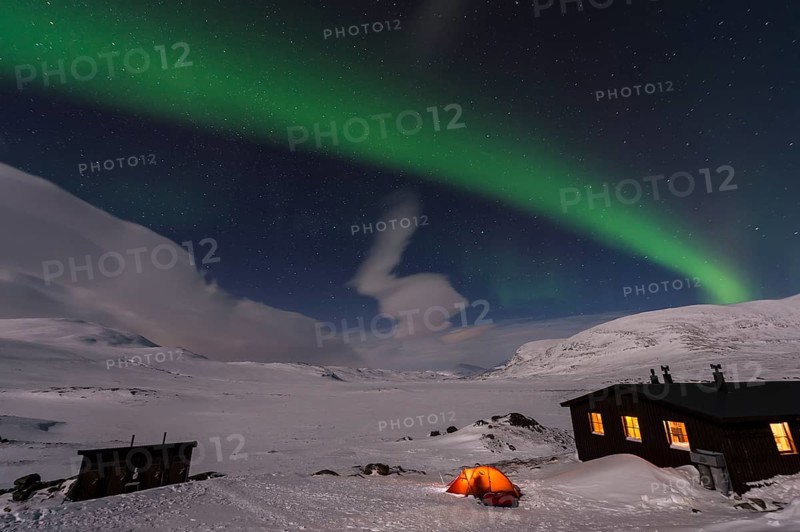 Northern Lights (Aurora borealis) over moonlit mountains on the long-distance hiking trail Kungsleden, Alesjaure, Norrbotten Lapland, Sweden, March 2013, Europe