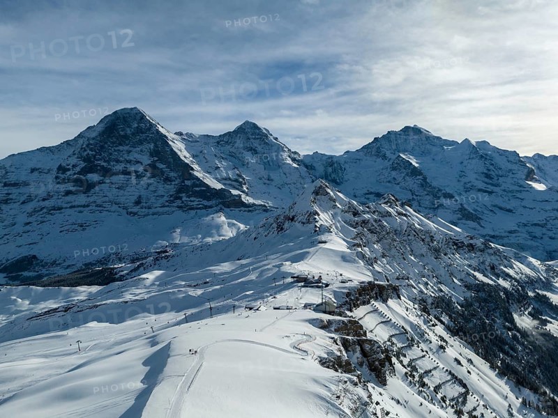 Eiger North Face and Monch Mountains in Winter. Swiss Alps. Switzerland. Aerial View