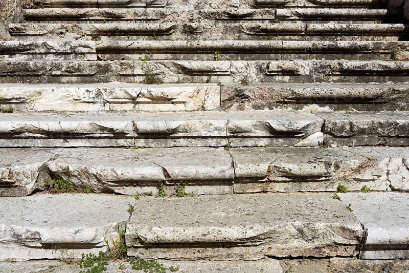 Aged weathered ancient roman stairs castle stairway in Spain