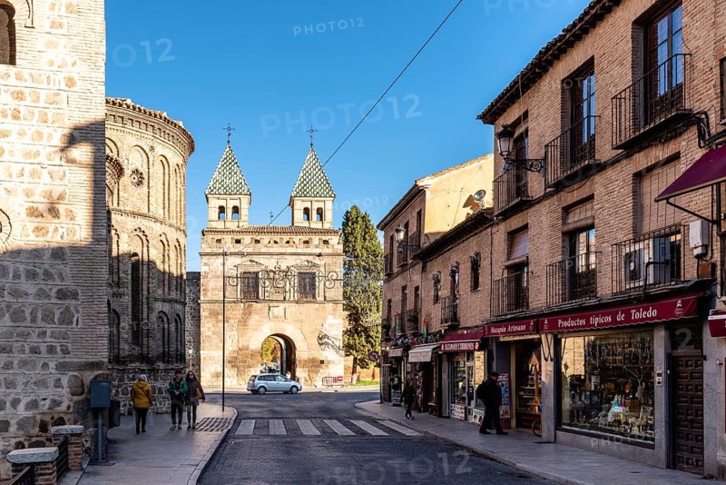 Toledo, Spain, December 6, 2019: The New Bisagra Gate and Santiago del Arrabal church. Real del Arrabal street, Europe