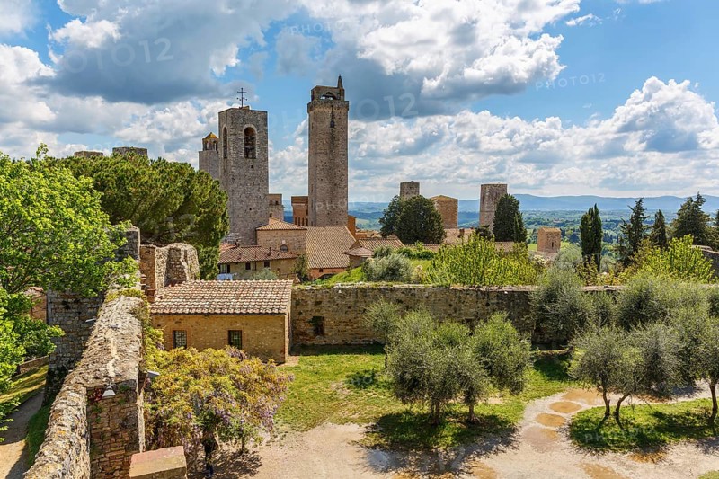 Courtyard of the ancient fortress ruin in the city of San Gimignano in Italy
